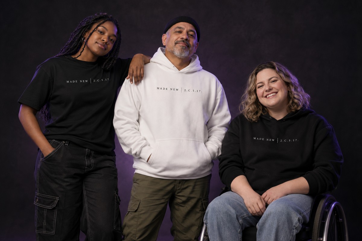 A diverse group of models wearing black and white Hope apparel