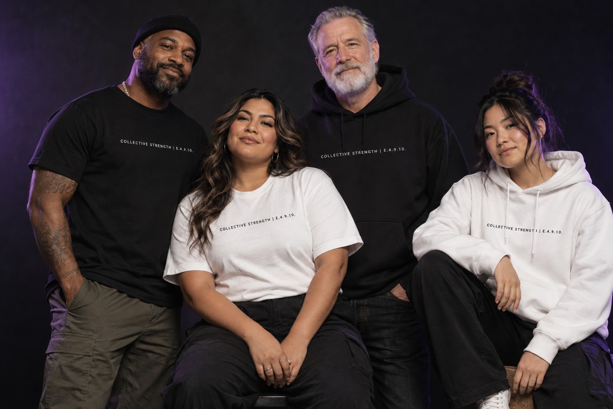 A diverse group of models wearing black and white Together apparel